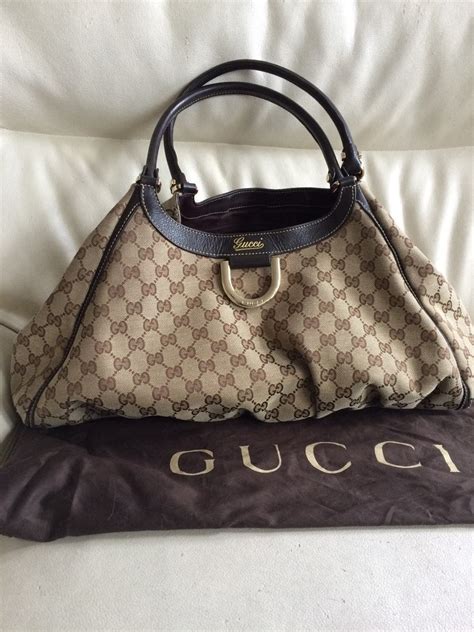 cuanto cuesta una bolsa gucci|bolsas gucci originales precios.